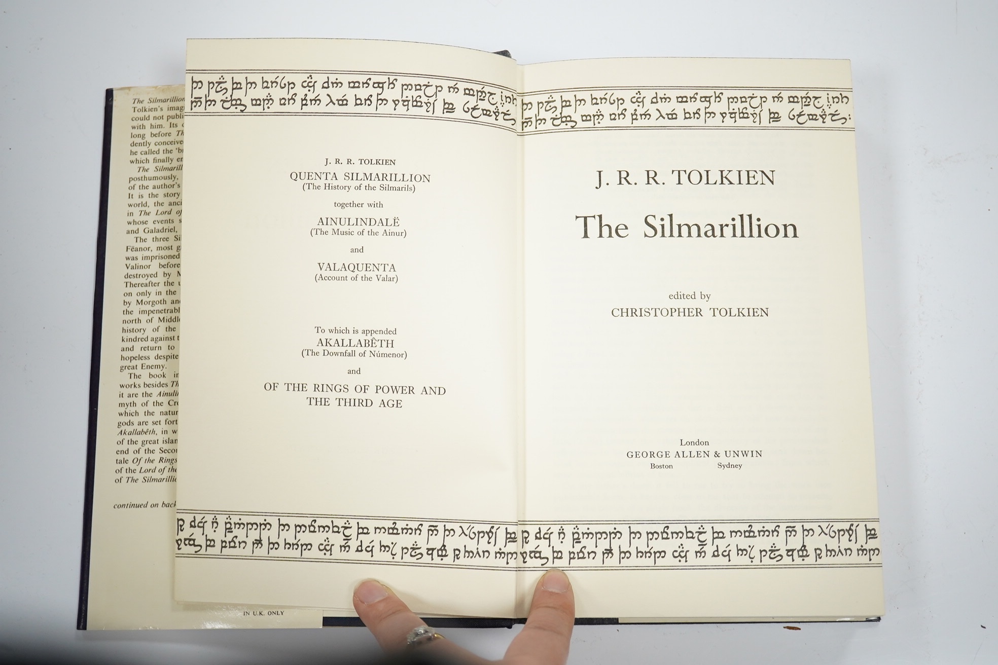 Tolkien, J.R.R. The Silmarillion. Edited by Christopher Tolkien. First Edition. large folded and coloured pictorial map, title within decorated borders; publisher's gilt cloth and d/wrapper. George Allen & Unwin, 1977